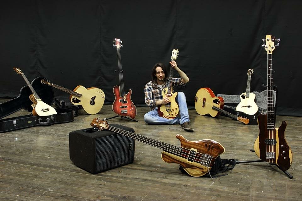 Enrico Savoncelli with his handmade guitars